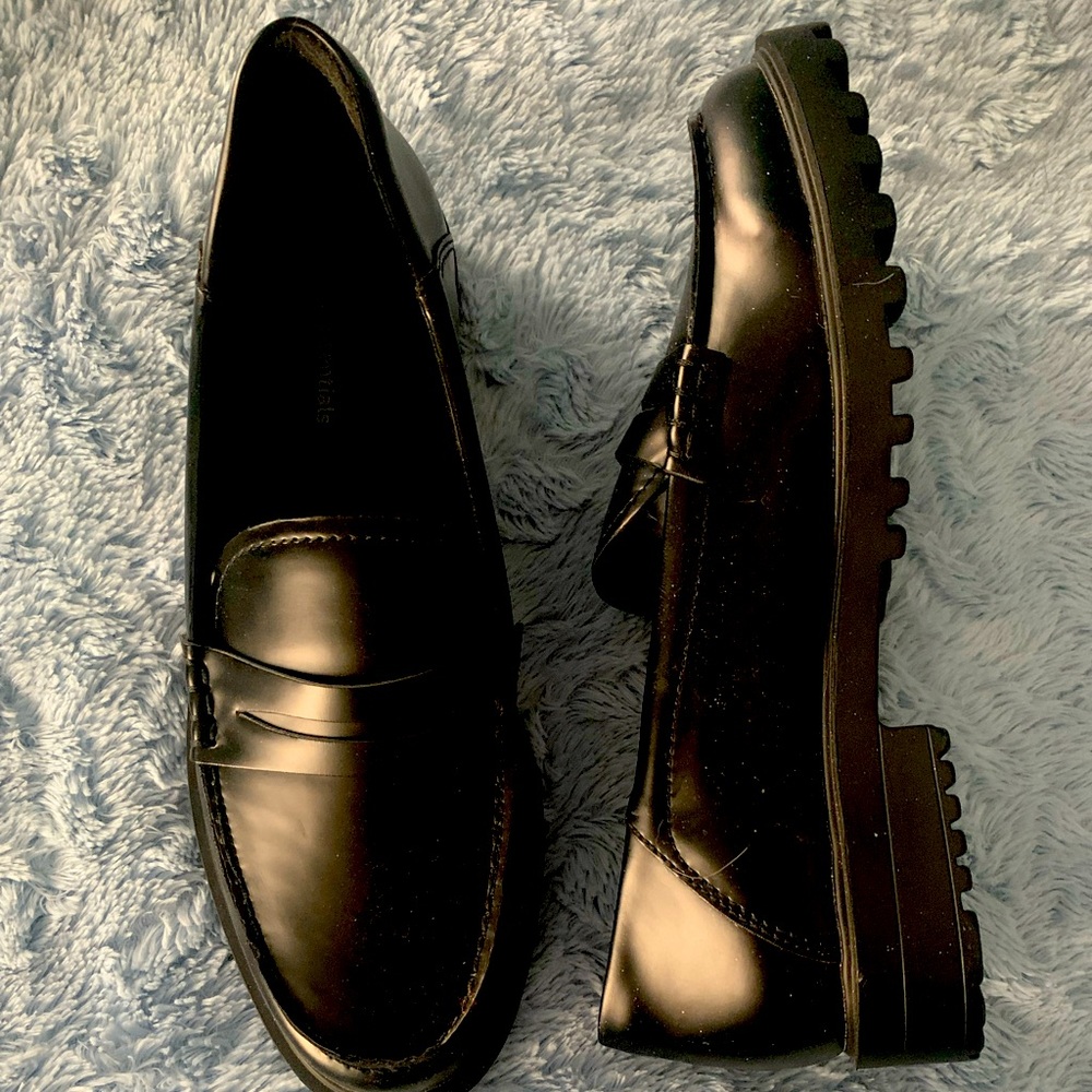 Women’s black loafers.  New in box.